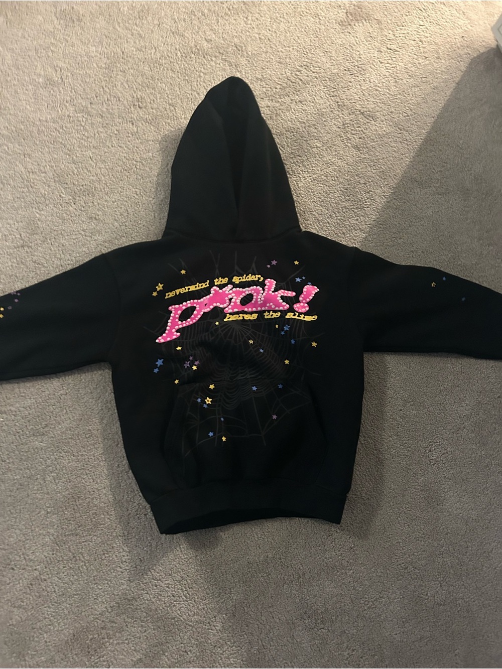 Black Hoodie with Pink 'poli' Graphic and Star Accents